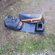 On new sleds the fuel tank and seat are separate. My old seat was stapled directly to the tank base.